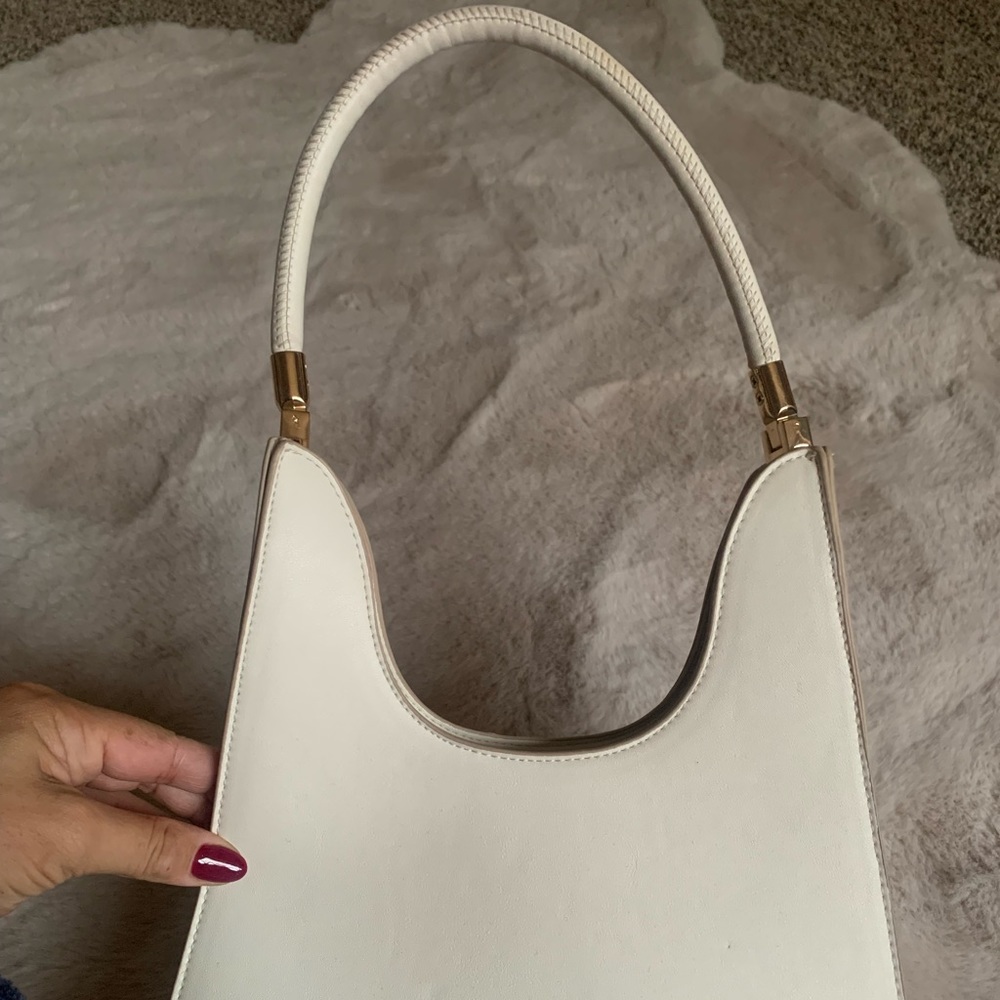 Target white handbag with gold detail -